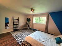 The blue room is one of the largest in the house and overlooks our beautiful back yard.