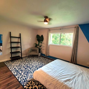 The blue room is one of the largest in the house and overlooks our beautiful back yard.