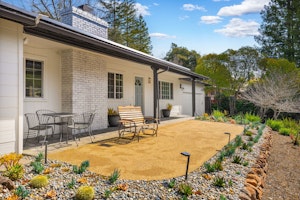 Beautifully xeriscaped front yard with relaxing views on a quiet street