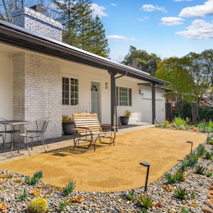 Beautifully xeriscaped front yard with relaxing views on a quiet street