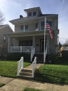 Front of home with patio