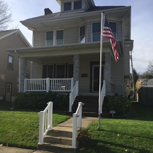 Front of home with patio