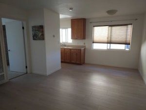 Living Area to Kitchen and Bedroom