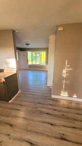 //hemlane-production.s3.amazonaws.com/uploads/property_listing_photos/30e7d517-cb40-4053-a163-ce7ec0be86e5/dining to living.jpg