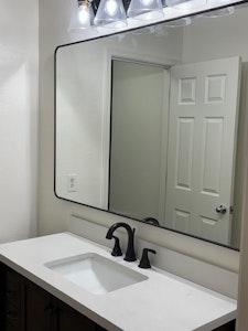 //hemlane-production.s3.amazonaws.com/uploads/property_listing_photos/46230748-f5b7-47ad-aec8-724cb743dee7/Bathroom_2_Mirror_Sink.jpg