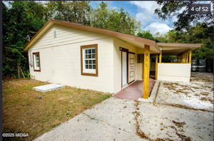 A cozy, well-maintained home featuring a welcoming front porch, private driveway, and spacious yard—perfect for comfortable everyday living.