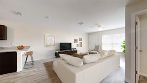 //hemlane-production.s3.amazonaws.com/uploads/property_listing_photos/4fb15ce3-9e7a-4f7d-ab85-b717429b121d/2-2-Living.jpg
