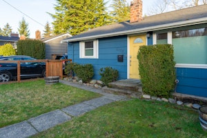 Fenced front yard with off-street parking for 2-3 cars