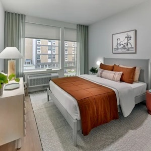 //hemlane-production.s3.amazonaws.com/uploads/property_listing_photos/70329f9c-59c3-47db-bdf0-e9367b9231e0/le leo bedroom.webp