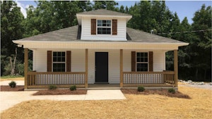 Front - Beautiful, shady porch.  Patio to side.