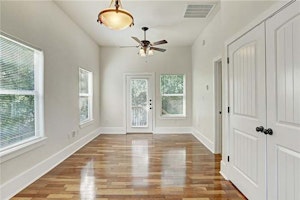 Living area w/ washer and dryer (in closet)