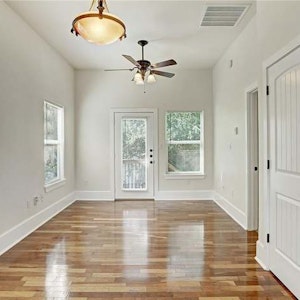 Living area w/ washer and dryer (in closet)