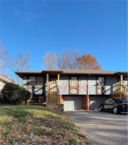 Duplex with 1 Car Garage and Off Road Parking