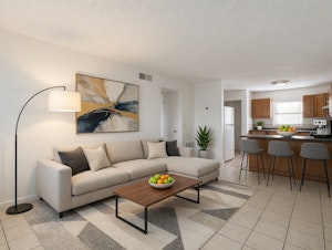 //hemlane-production.s3.amazonaws.com/uploads/property_listing_photos/8995fd05-0845-4e36-80f2-3a63fe3dbda1/unit A living room staged.jpg