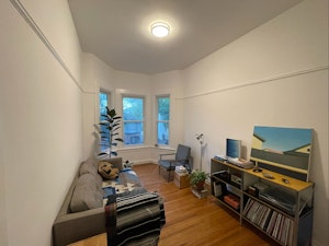 Front room  (NOTE: Shown as furnished by previous tenant, but offered unfurnished)