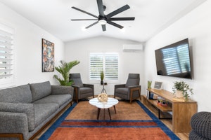 Reclining chairs, board games, 60” TV equipped Netflix and Disney+ streaming.