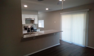 //hemlane-production.s3.amazonaws.com/uploads/property_listing_photos/a2b5dbc3-32ea-40e2-8663-d7dc8d254013/Kitchen view from Living Room.jpg