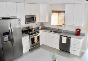 Updated Kitchen with Slab Quartz Countertops