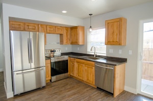 Custom cabinets and stainless steel appliances