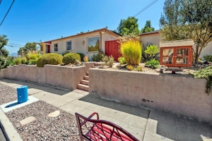 Welcome home! 3533 Juniper is the right half of this duplex, private entry behind the red gate