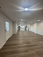 Living room with storage closet, LED Recess lighting , LVP Flooring , Shades are provided for all the Windows