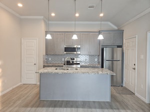 //hemlane-production.s3.amazonaws.com/uploads/property_listing_photos/f812dabf-aa6f-4b13-af38-41f7cb72301b/Kitchen.jpg