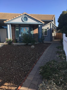 Front of House Showing Both Front Door and Side Door Entrance to Bonus Room